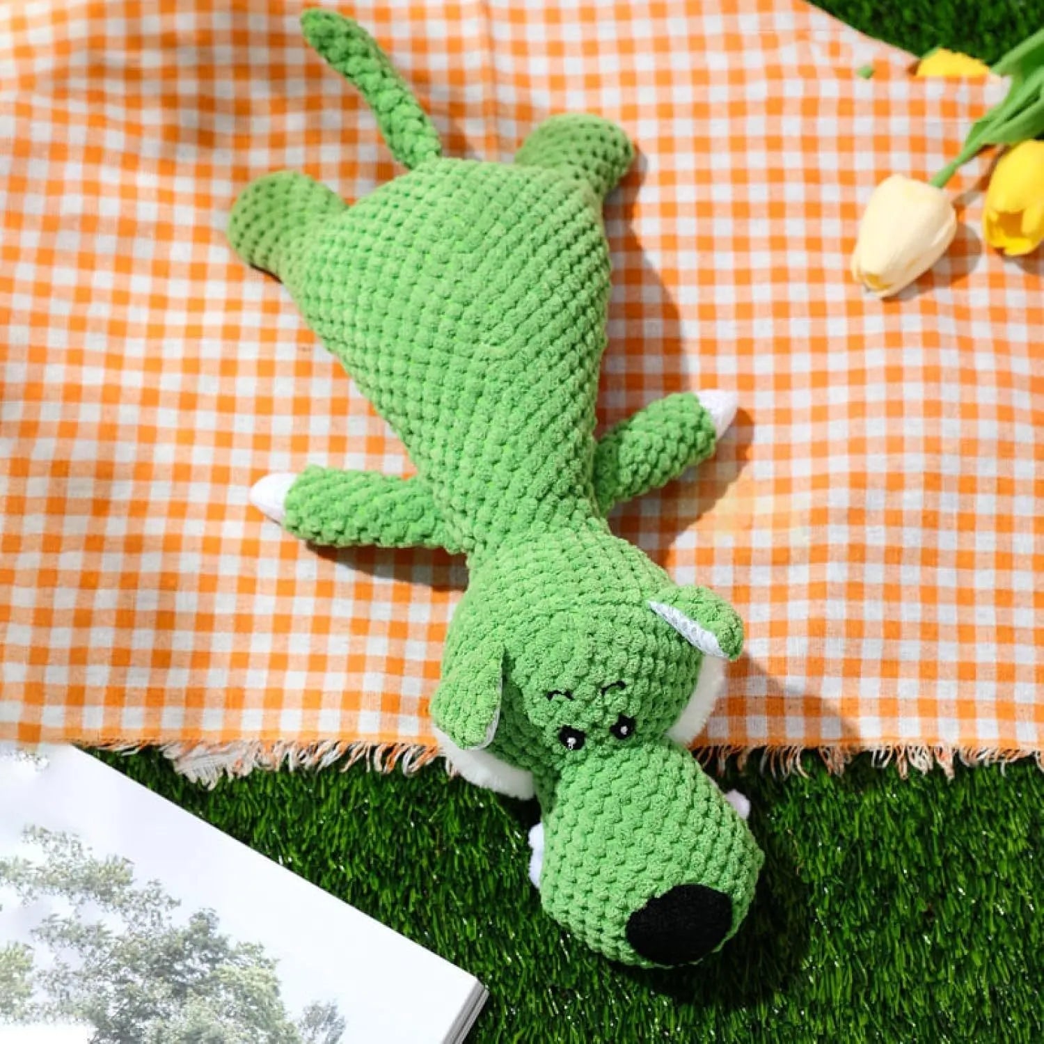 Colourful plush dog toy in animal shape with corn kernel texture and squeaker.