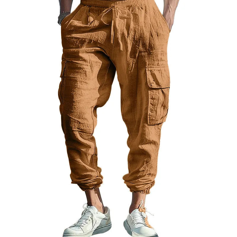 Men's loose-fit linen trousers in Army Green with ankle-tied cuffs and multiple pockets.