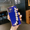 Electroplated pearl bracelet silicone phone case for Apple 15, all-inclusive cover with chain detail, black shell