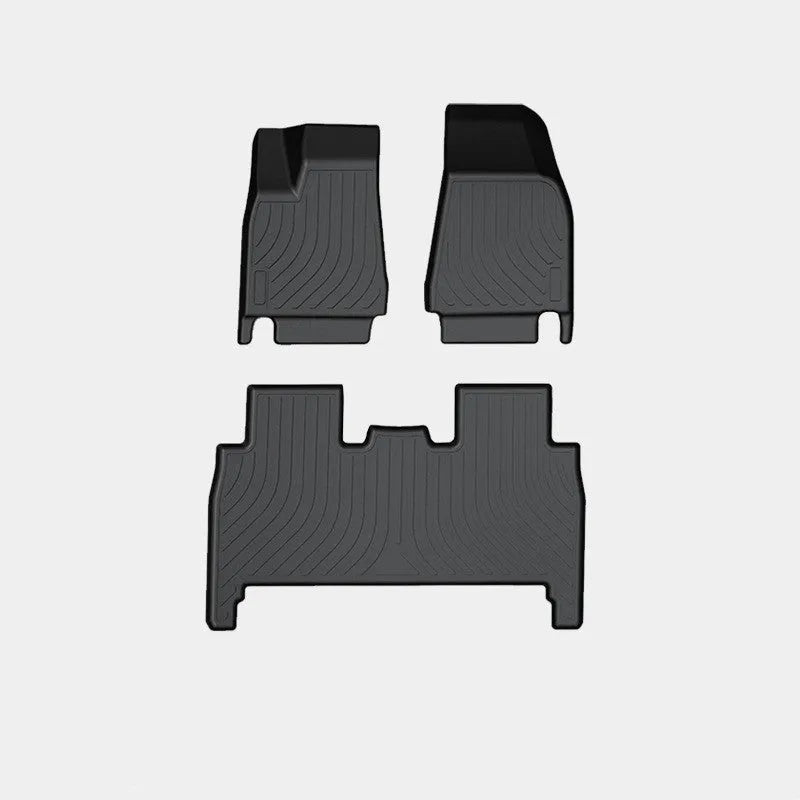 Tesla Model X waterproof TPE rubber floor mats showing left and right rudder design for vehicle-specific fitment