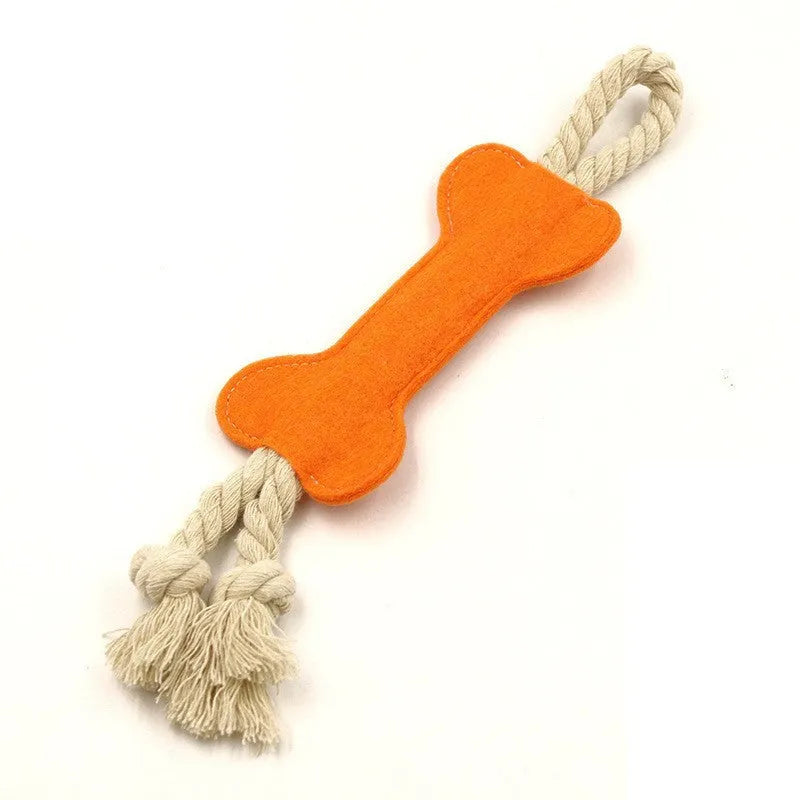 Bone-shaped dog chew toy with felt exterior showing rope knot texture inside, 16cm long in blue colour