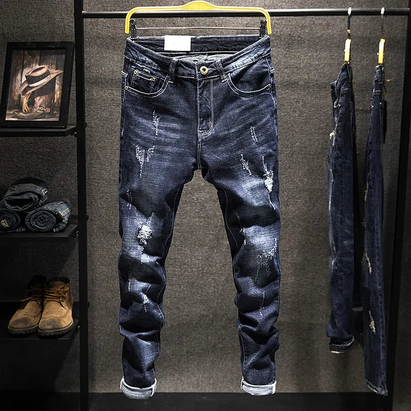 Men's slim-fit blue jeans with micro-elastic denim fabric on hanger