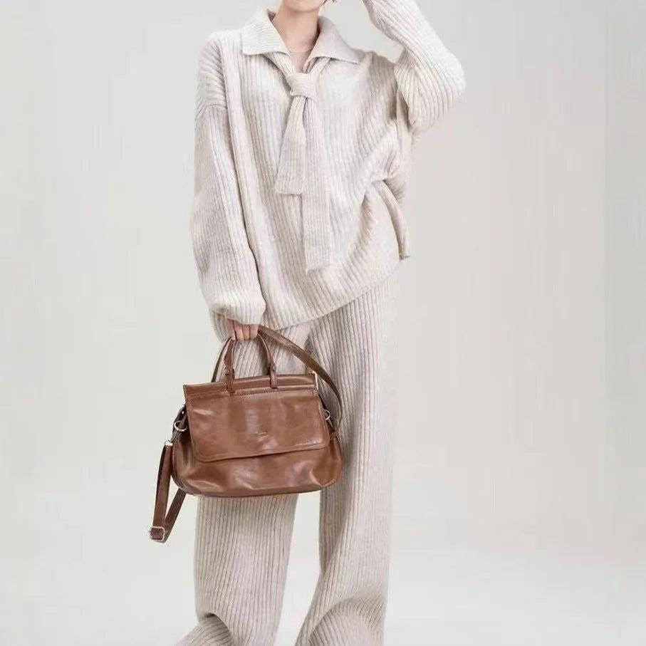 Ladies elegant knit sweater suit two-piece set in imitation cashmere, showing top and trousers in beige.