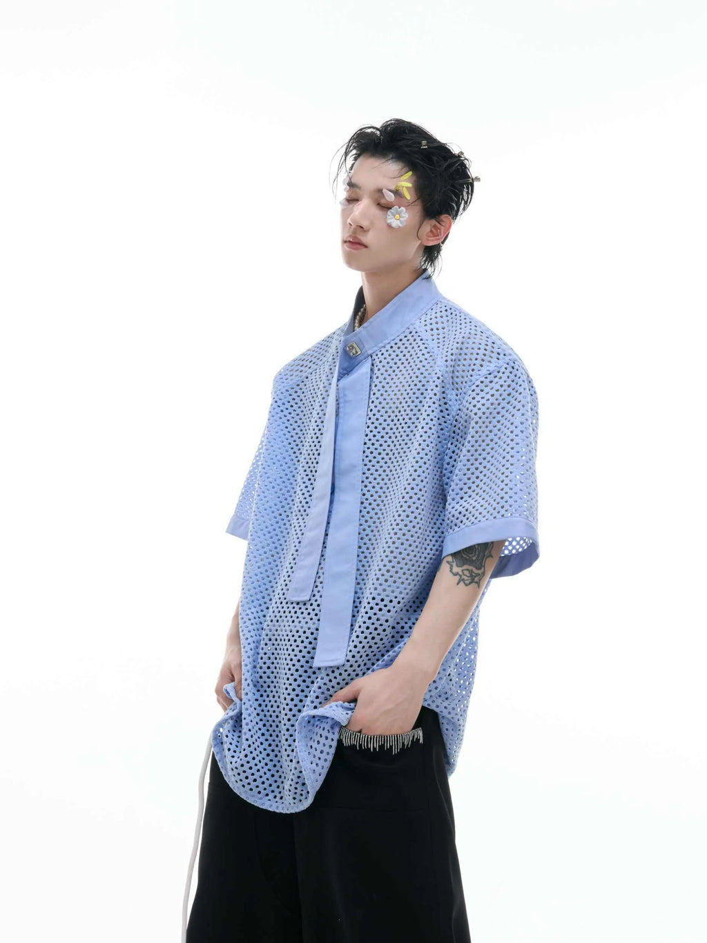 Men's black T-shirt with tie stitching and metal tassel decoration on front