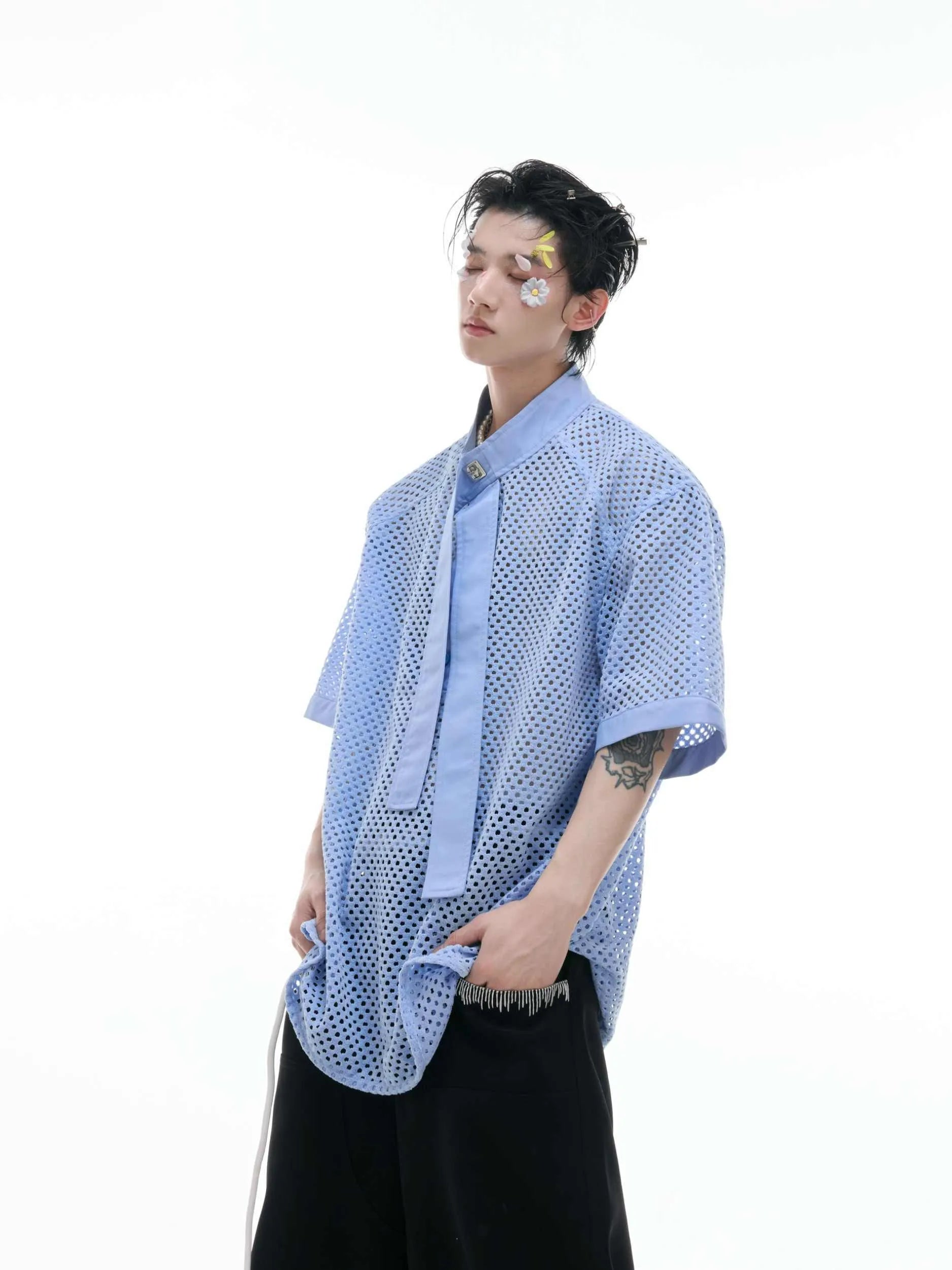 Men's black T-shirt with tie stitching and metal tassel decoration on front