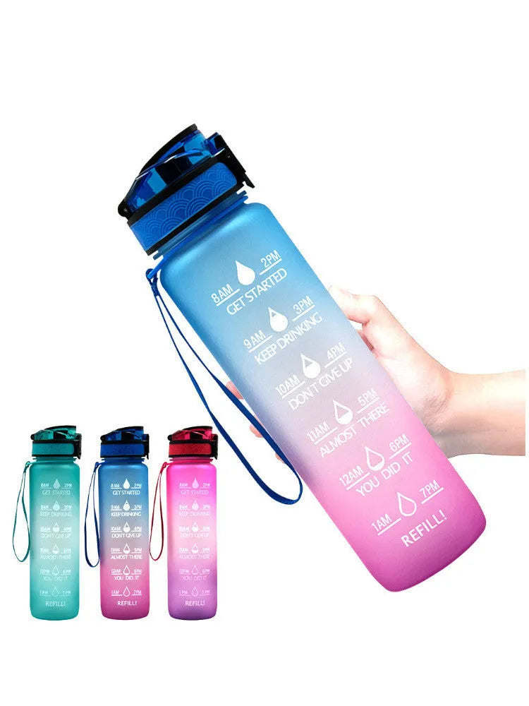 Transparent 1000ml BPA-free Tritan sports bottle with infuser and clear liquid visible