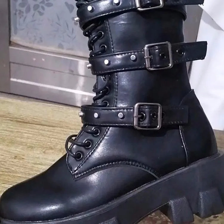 Women's black mid-calf knight boots with metal buckle detailing and side zipper closure