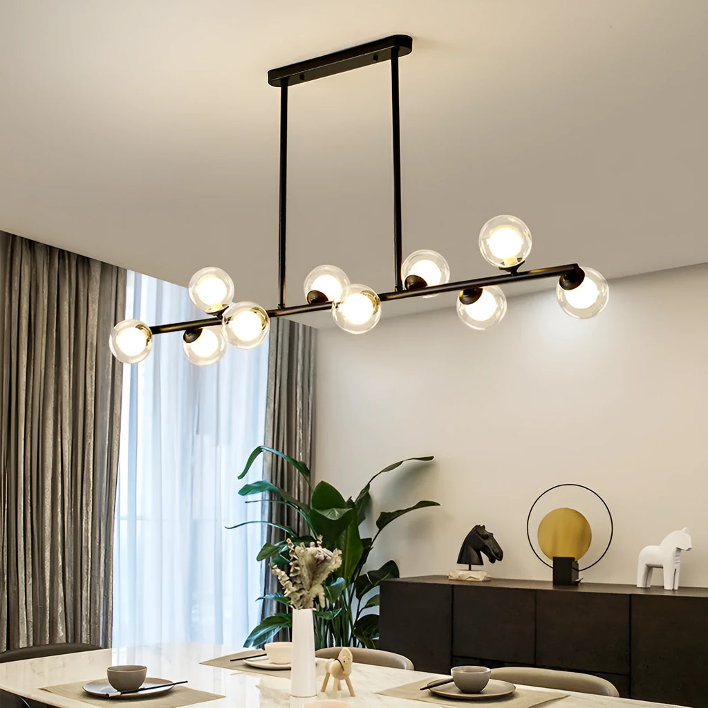 Modern minimalist glass bubble ball chandelier with black iron body and clear glass shades in a Nordic style