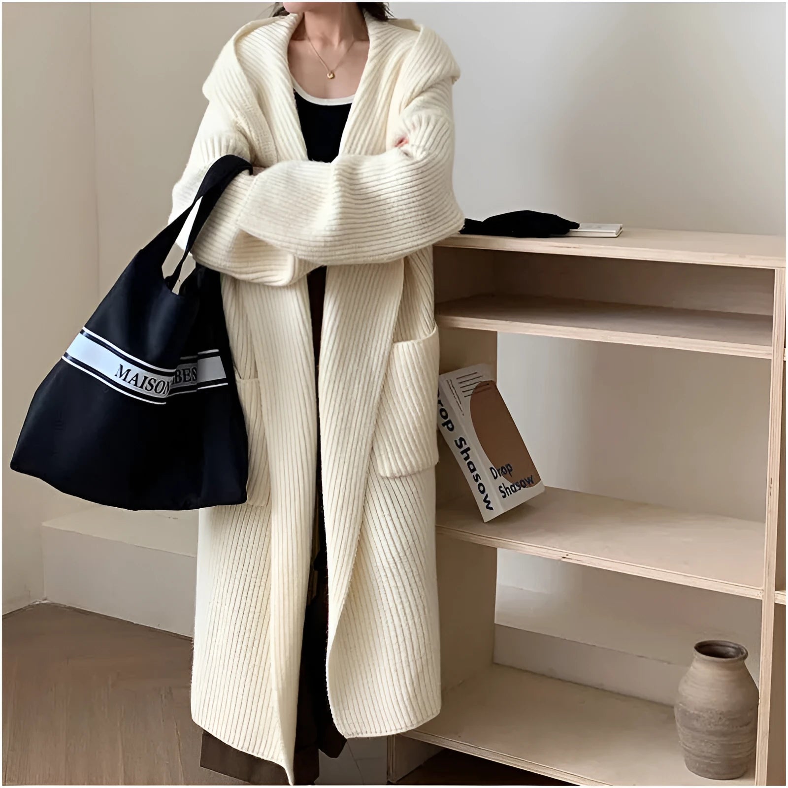 Women's loose hooded cardigan coat in acrylic fabric with raglan sleeves.
