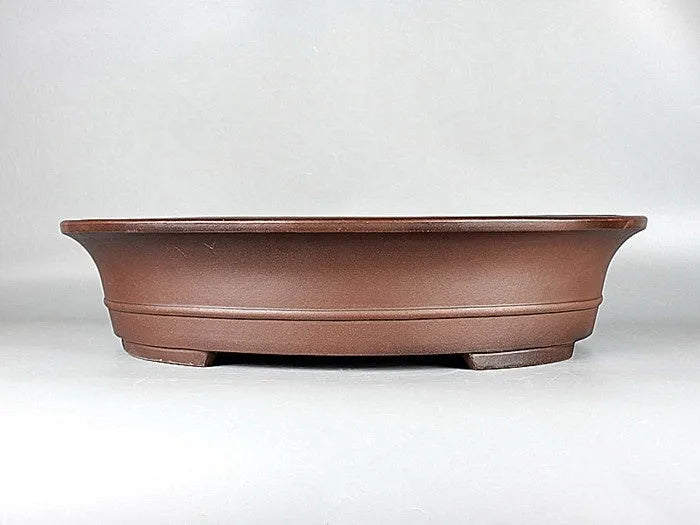 Handmade antique oval bonsai pot in Yixing purple mud, outer dimensions 66cm by 53cm, with a large planting area for pine and cypress