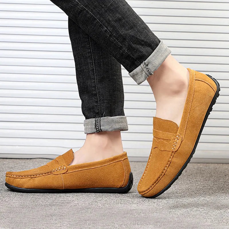 Men's solid colour suede loafers with slip-on design and round toe