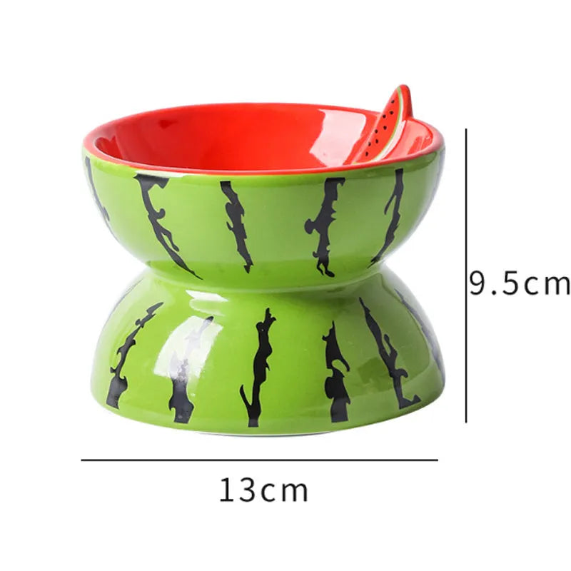 Ceramic raised cat bowl with tilted design in orange, pitaya or watermelon pattern.