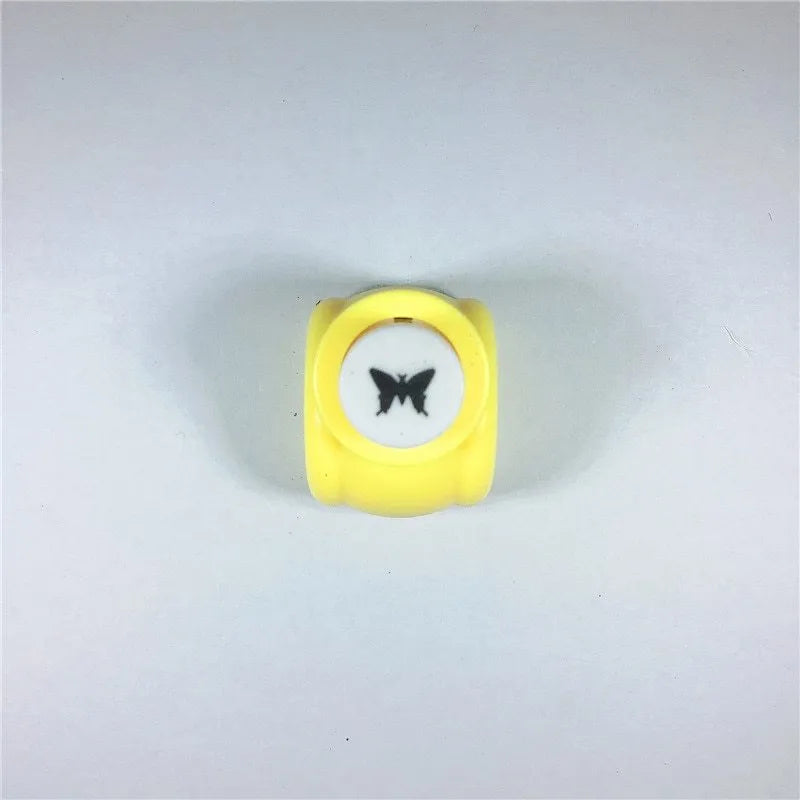 Plastic student stationery embossing device 3x2.5x3cm with decorative pattern
