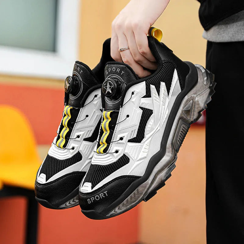 Men's black rotating button dad shoes with mesh upper and platform sole on a white background.