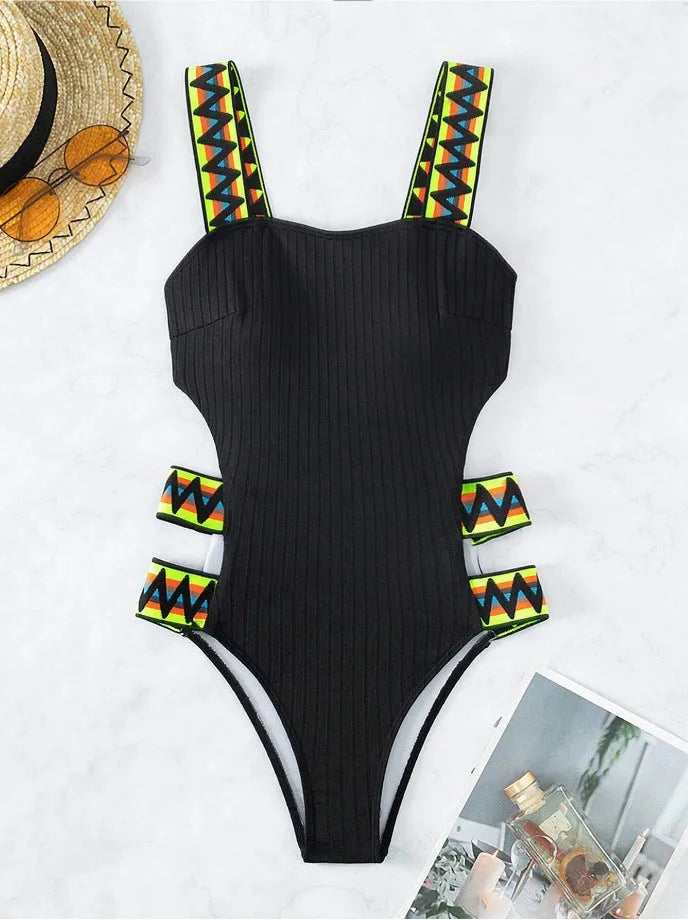 Women's solid black one-piece swimsuit bikini made from polyester fabric