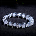 Women's white crystal bracelet with pyramid charm and Ruyi decorative elements