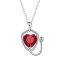 Women's copper stethoscope necklace with red diamond colour pendant on model