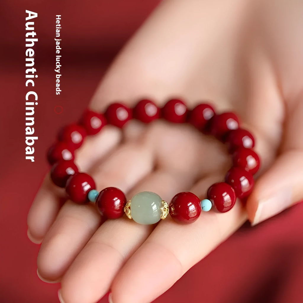 Purple gold sand cinnabar bead bracelet with geometric ellipse shapes on a wrist.