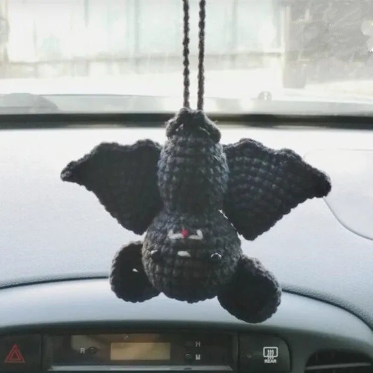 Plush hand-woven polyester automobile hanging ornament with cartoon style design on car dashboard