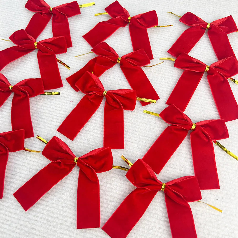 Handmade velvet Christmas tree bow decoration in red with tie attachment