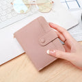Ladies' short wallet with lychee pattern texture in 2-fold design, available in four colours