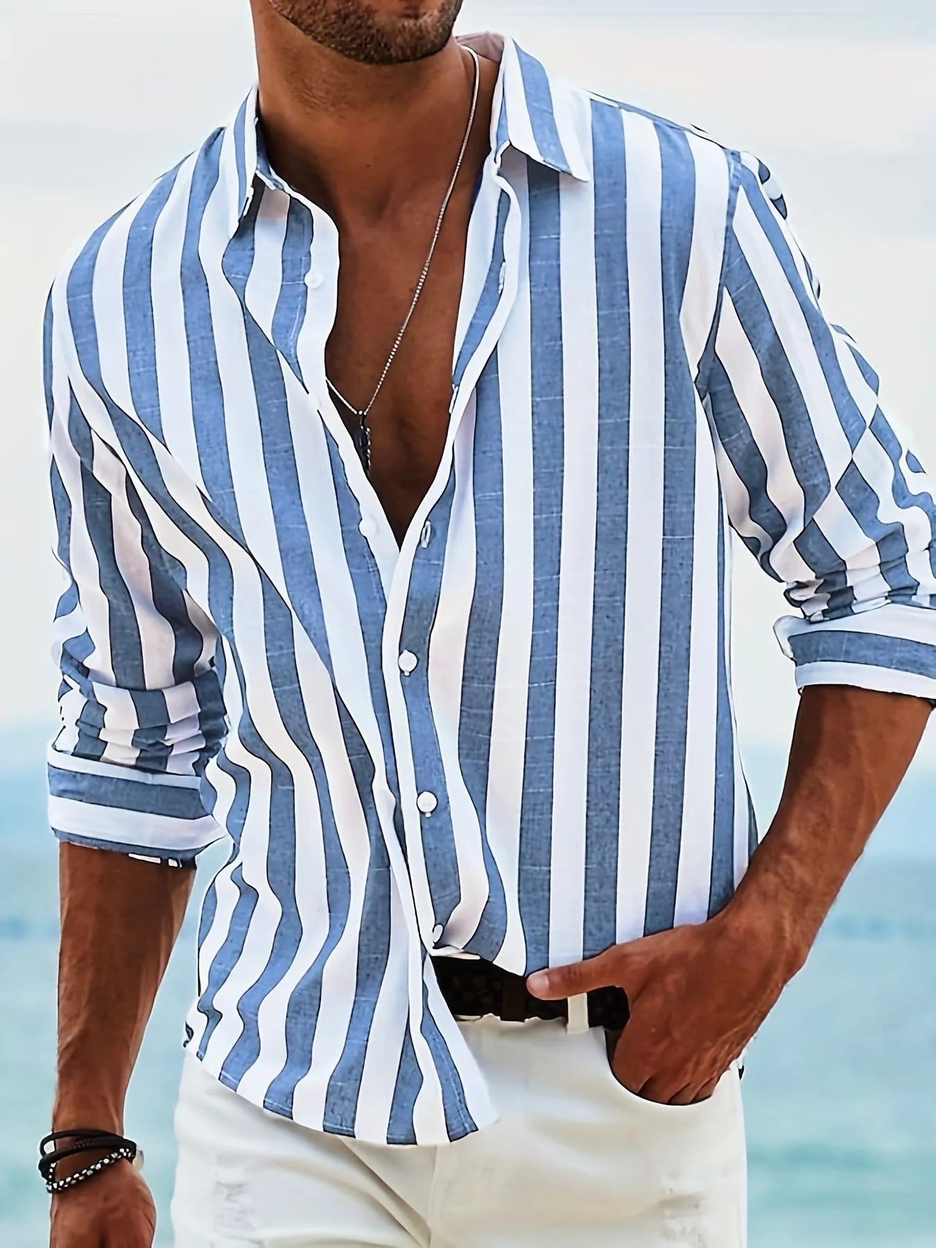 Men's loose-fit striped long-sleeved casual shirt in a light grey colour, showing cardigan style.