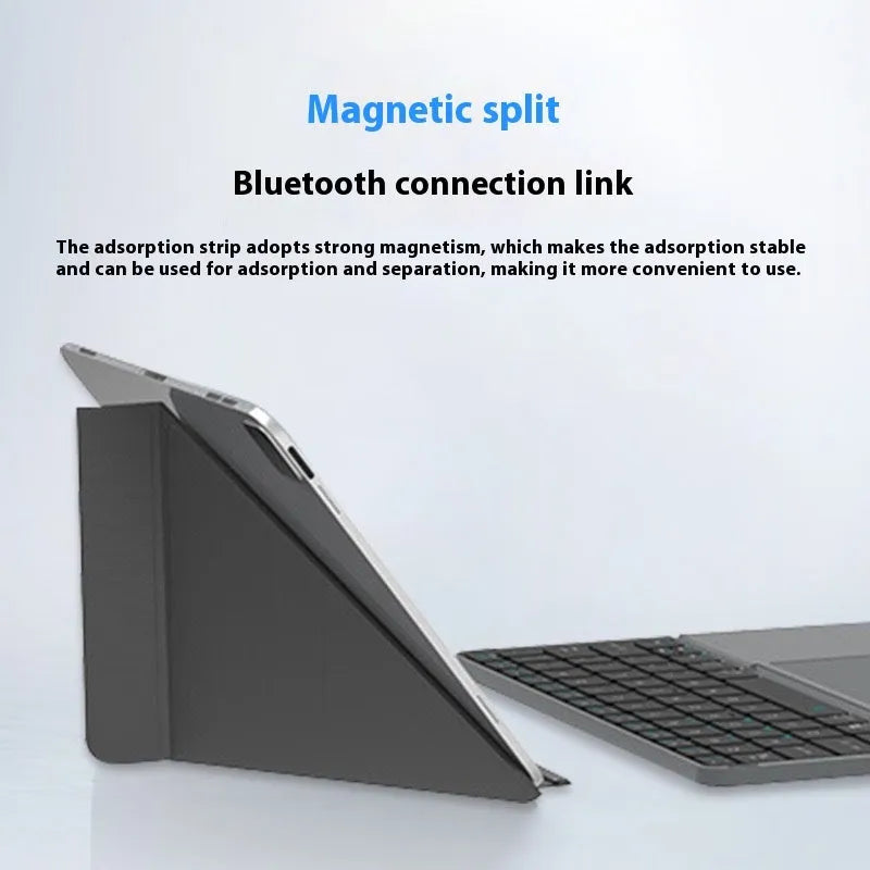 Grey wireless Bluetooth folding keyboard for mobile phones and tablets showing compact folded design