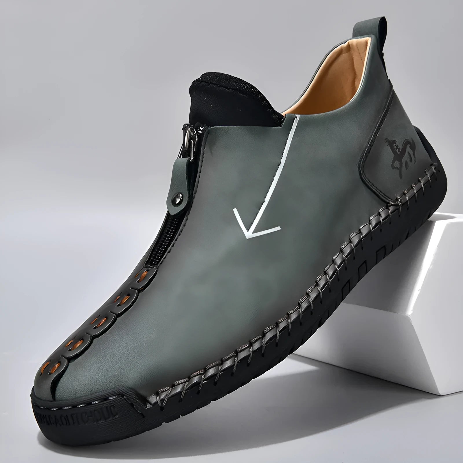 Men's black leather-look casual boot with front zipper, round toe, and mid-calf shaft.