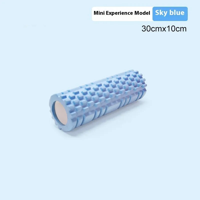 EVA foam roller for fitness in various colours and sizes on a gym floor.