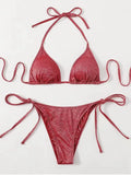 Women's bandage style bikini swimsuit with halter neck top and briefs in polyester fabric