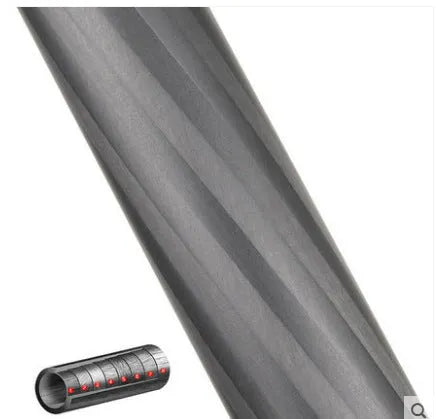 Black carbon fibre monopod for DSLR cameras extended to full height with camera mount visible
