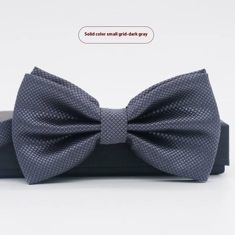 Solid colour flat head bow tie for formal wear in multiple colours including black, red, and blue.