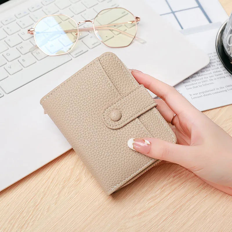 Ladies' short wallet with lychee pattern texture in 2-fold design, available in four colours
