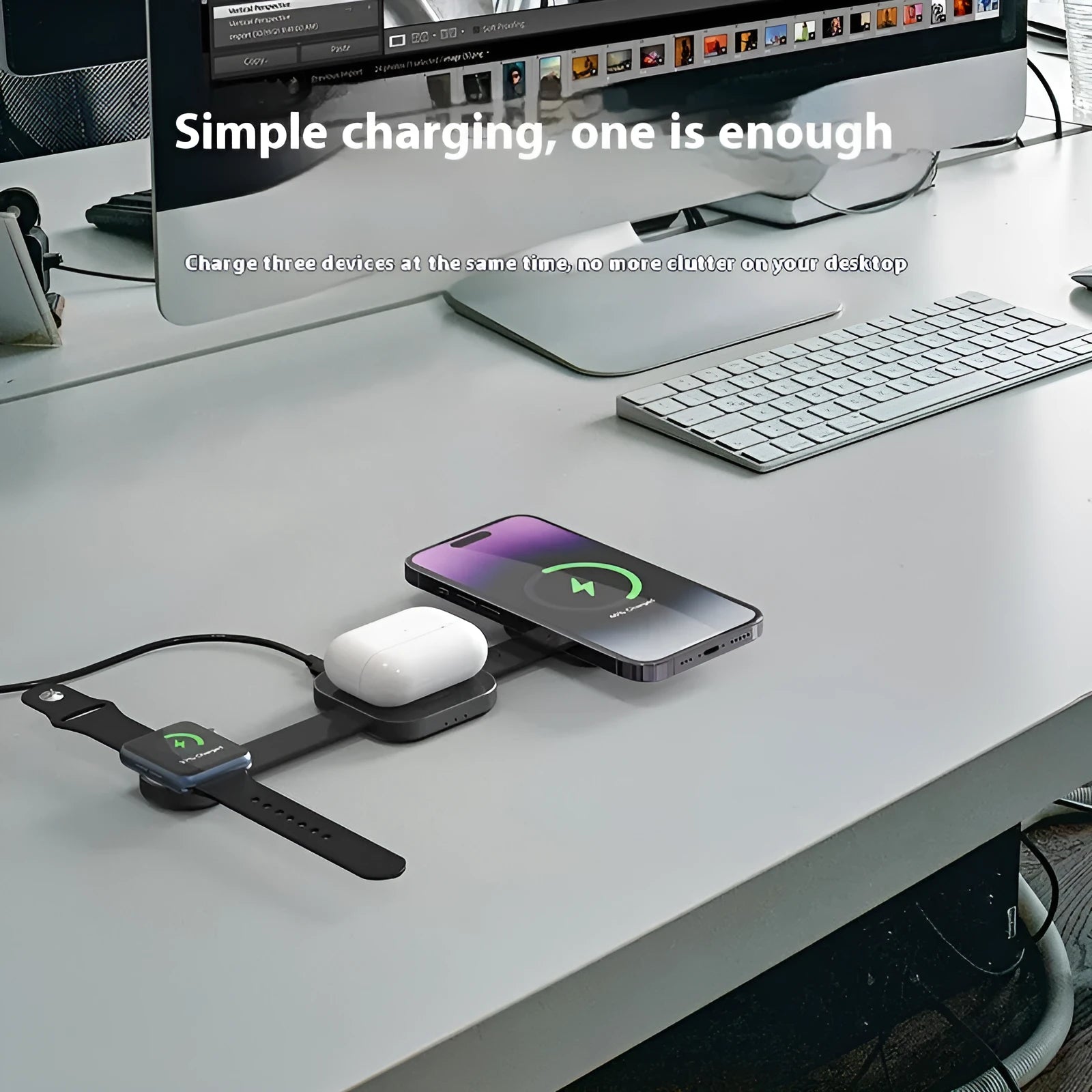 Three-in-one magnetic wireless charger stand in dark grey with a smartphone, watch, and earphones placed on it