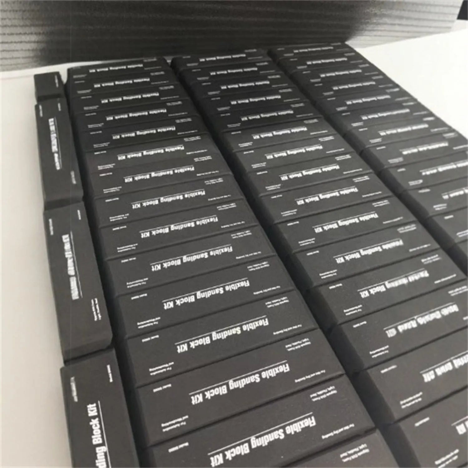 Set of seven black frosted EVA display blocks with visible metal fittings