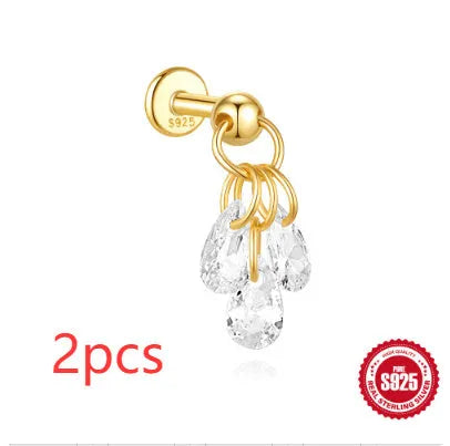 S925 sterling silver geometric star-shaped earrings with an embedded moon diamond, shown in a gold colour finish.