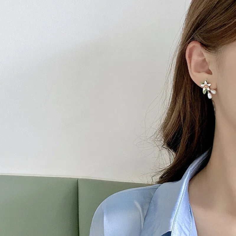 Women's contrast colour floral earrings with sterling silver needle detailing and alloy flower ear clip