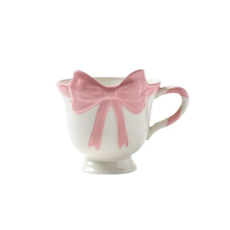 Ceramic mug with girl heart bow design in black pink colour