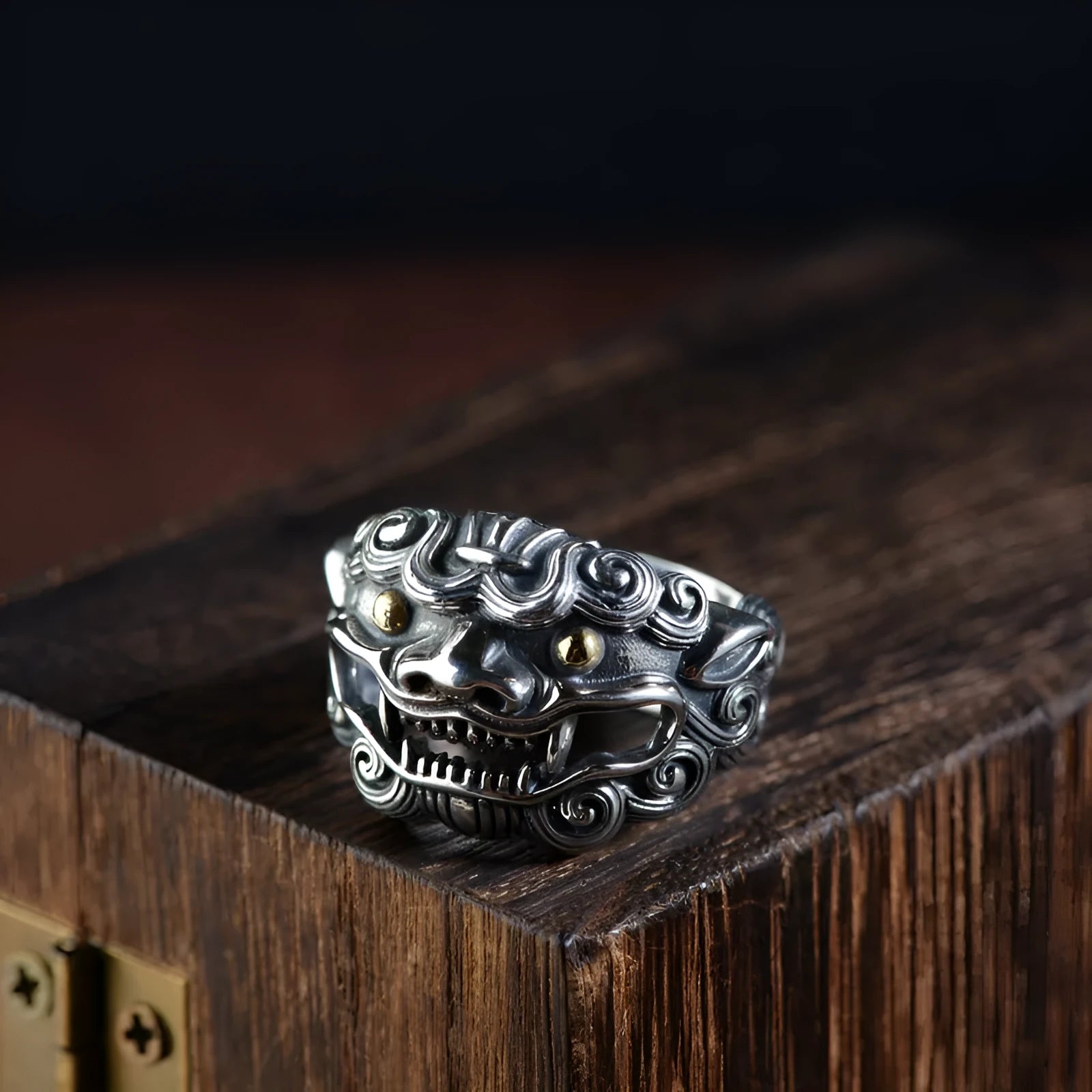 Silver open style diamond ring with a detailed jibeast and animal zodiac pattern.