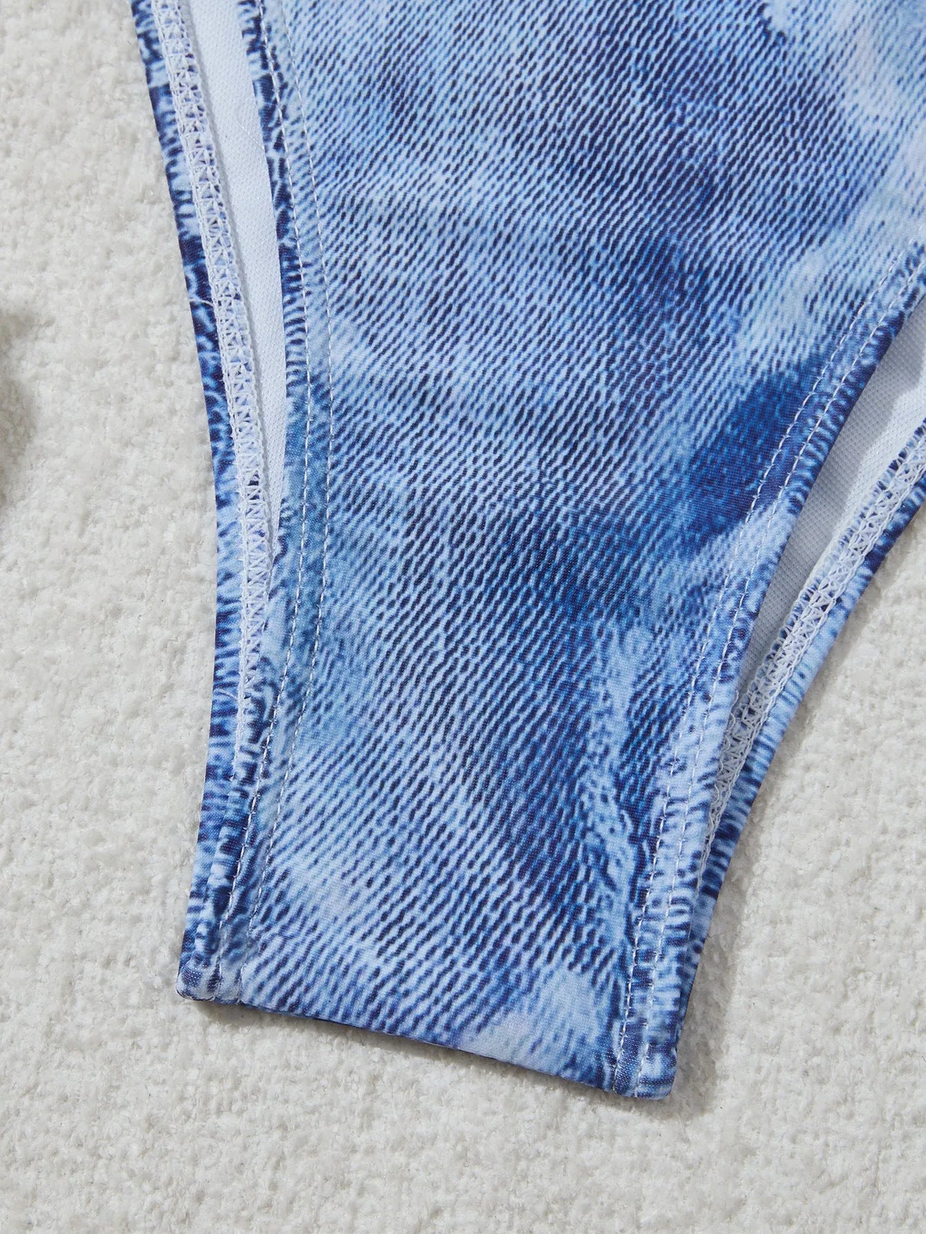 Women's denim blue printed bikini swimsuit with decorative strap detailing