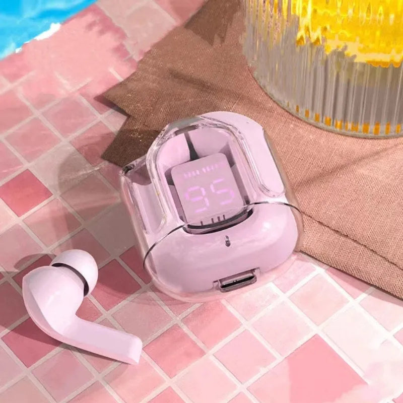 Transparent space capsule case showing true wireless Bluetooth earbuds with digital battery display