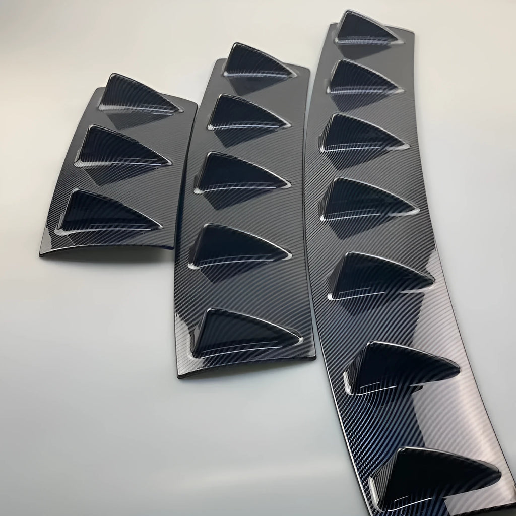 Automotive universal rear spoiler made of ABS plastic in bright black finish for GM cars
