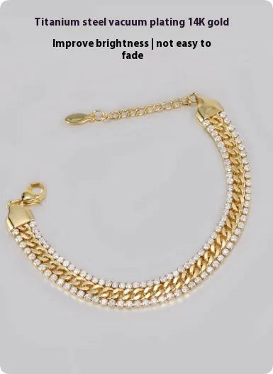 Gold tennis bracelet for men and women with titanium steel construction and gemstone inlays.
