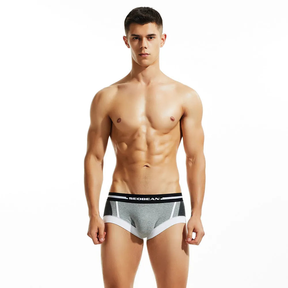 Men's low-waist cotton boxer shorts in dark blue, shown flat.