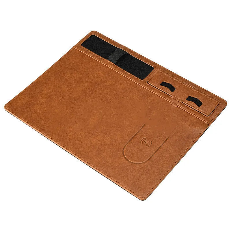 Wireless charging mouse pad with integrated phone holder on black PU leather surface