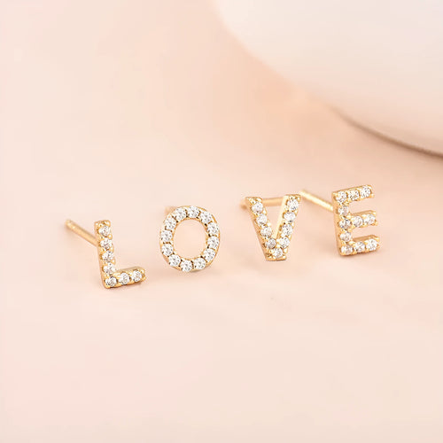 Brass gold plated alphabet letter earrings showing single letter from A-Z range with zircon detailing