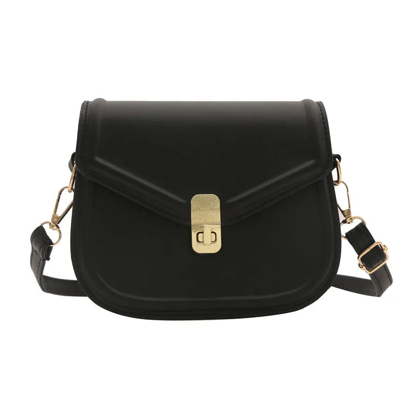 Soft PU leather clamshell messenger bag in horizontal square design shown in available colours.