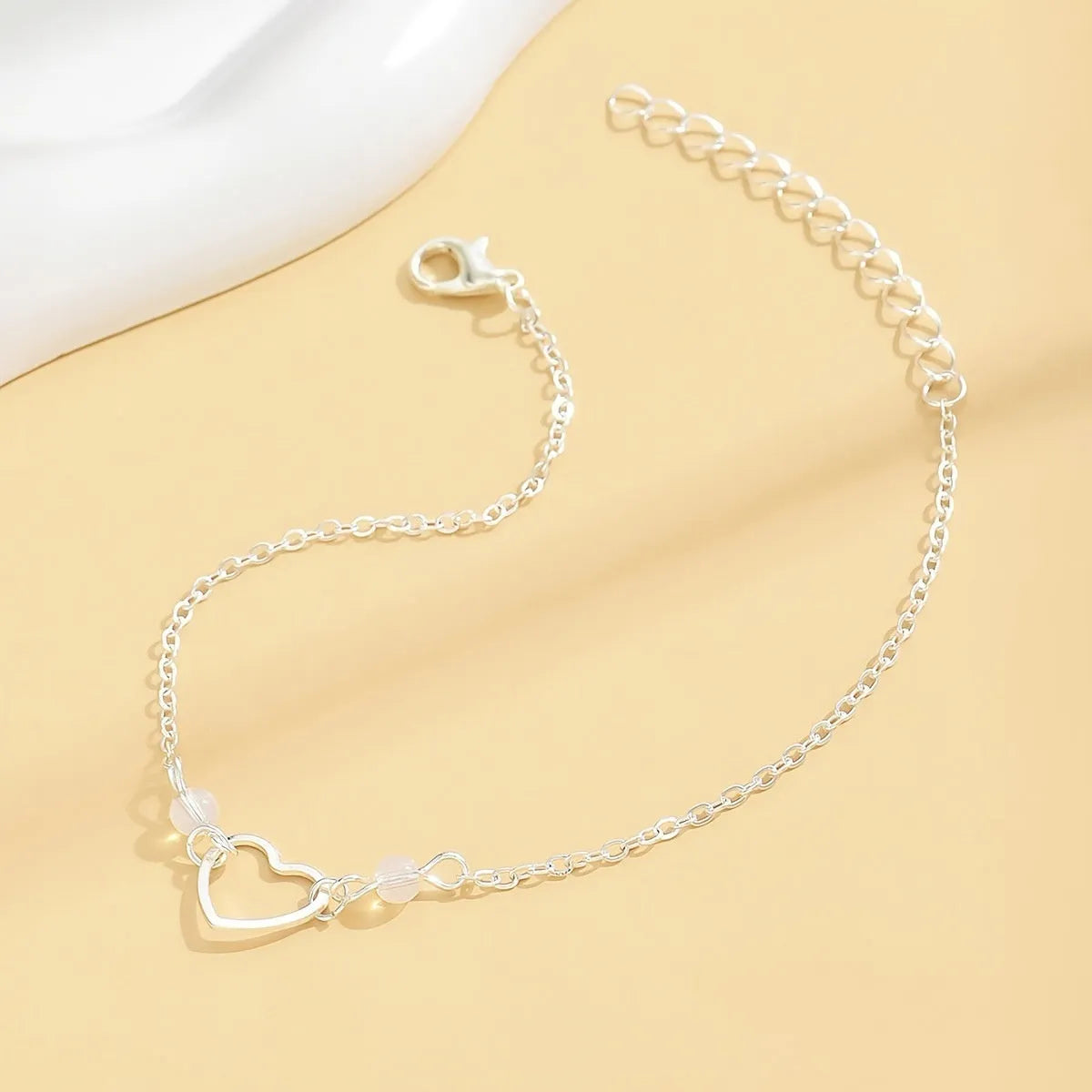 Women's adjustable anklet with heart pendant in gold or silver geometric style