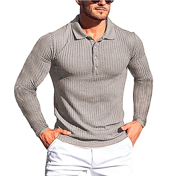 A striped, short sleeve, loose fit knit summer shirt on a hanger, available in multiple colours.
