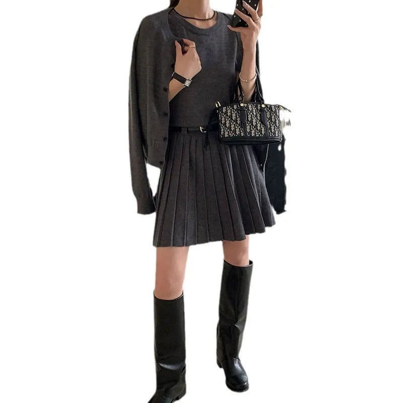 Women's grey art retro knitted vest skirt and cardigan two-piece set with 3D pattern.